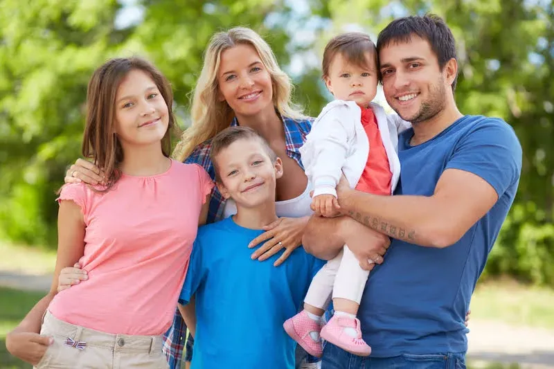 Happy parents with their children.