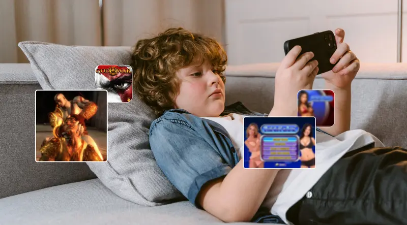 A boy is playing games on his phone.